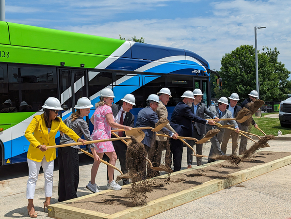 Federal, state, and county officials join private company representatives in breaking ground for a green microgrid project at the David F. Bone Equipment Maintenance and Transit Operations Center in Montgomery County, Maryland.