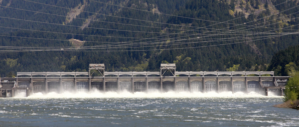 In this photo taken Tuesday, May 10 shows the Bonnevile Dam on the Columbia River, near Stevenson Wash. The manager of most of the electricity in the Pacific Northwest is running such a surplus of power from hydroelectric dams that it put wind farms on notice Friday they may be shut down as early as this weekend. A cold, wet spring in the headwaters of the Columbia River Basin is sending downstream one of the largest spring flows in years. (AP Photo/Rick Bowmer)