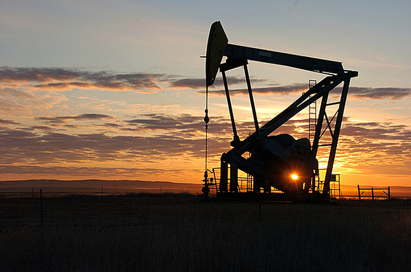 A pump jack pulls crude oil from the Bakken region of the Northern Plains near Bainville, Montana.