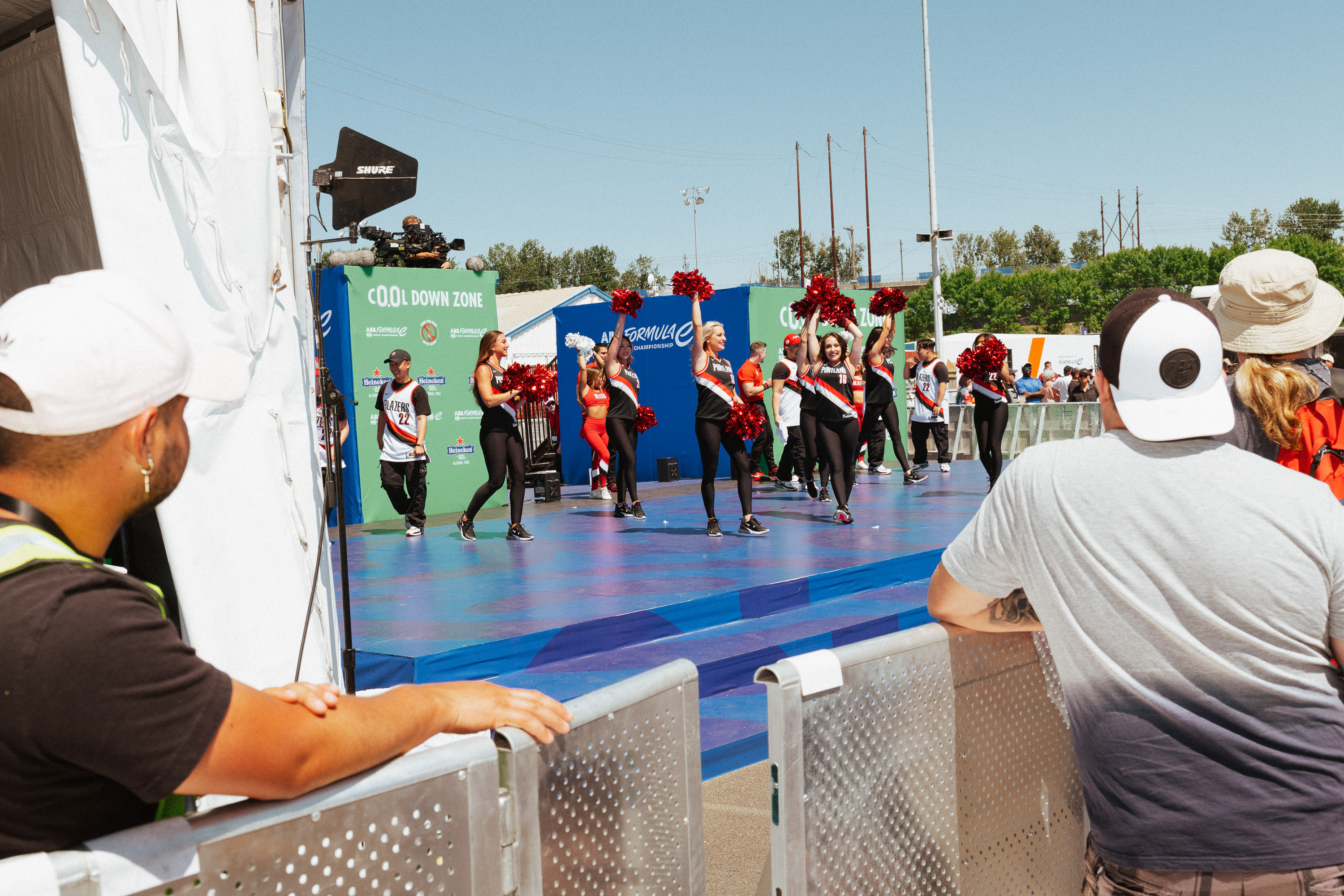 The Portland Trail Blazers dance team entertains the crowds at the Fan Village during the ABB FIA Formula E World Championship at Portland International Raceway.